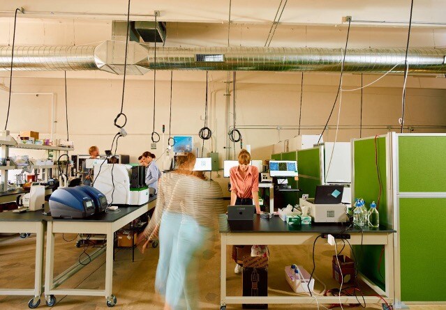 people working in an Enveda lab