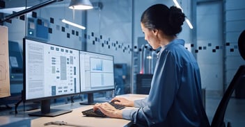 Photo of woman working at computer