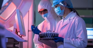 Scientists using lab equipement