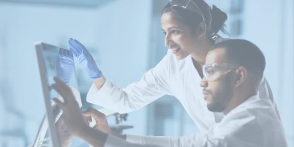 Two scientists working on procurement for their lab