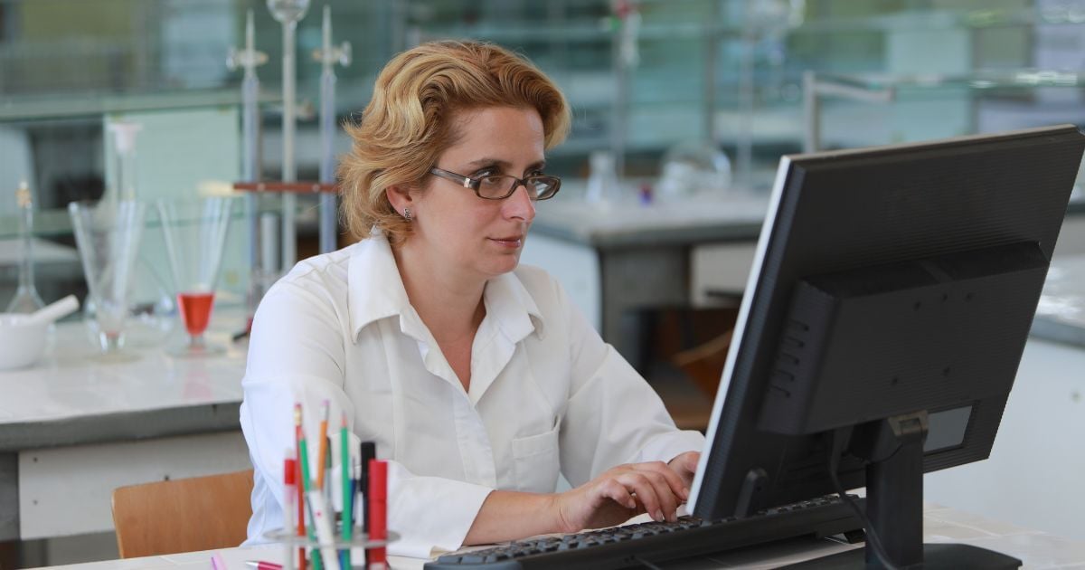 Scientist placing order on a computer