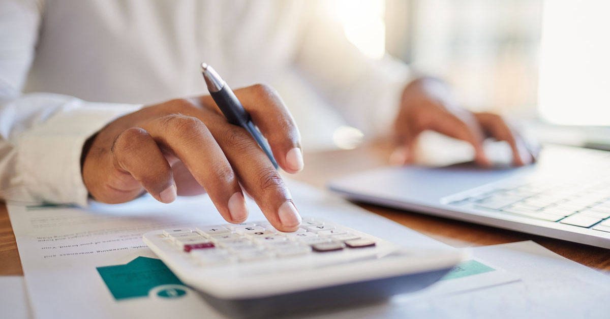 Photo of accountant using a calculator