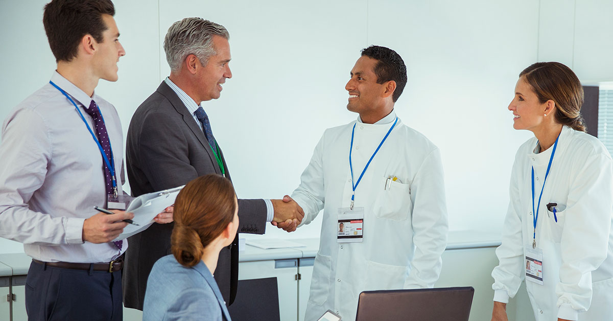 Scientists meeting wiht VCs in conference room